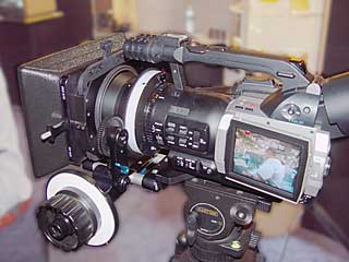 DVX100 with support rods, follow-focus, and sunshade
